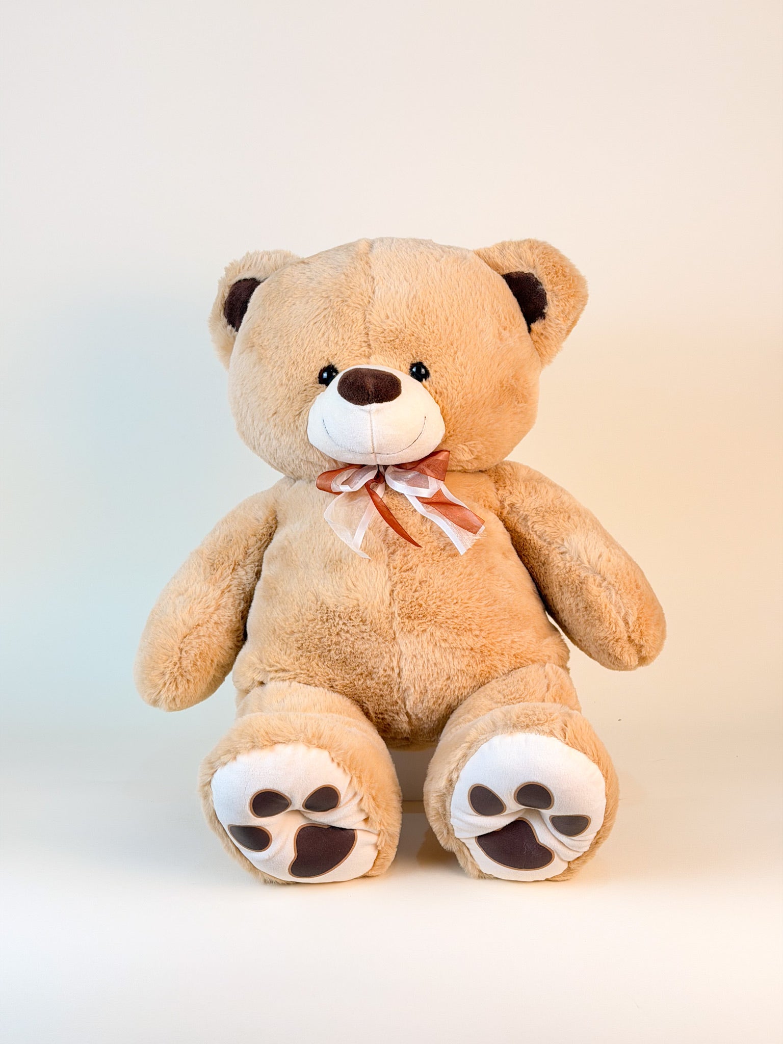 Oso peluche beige mediano